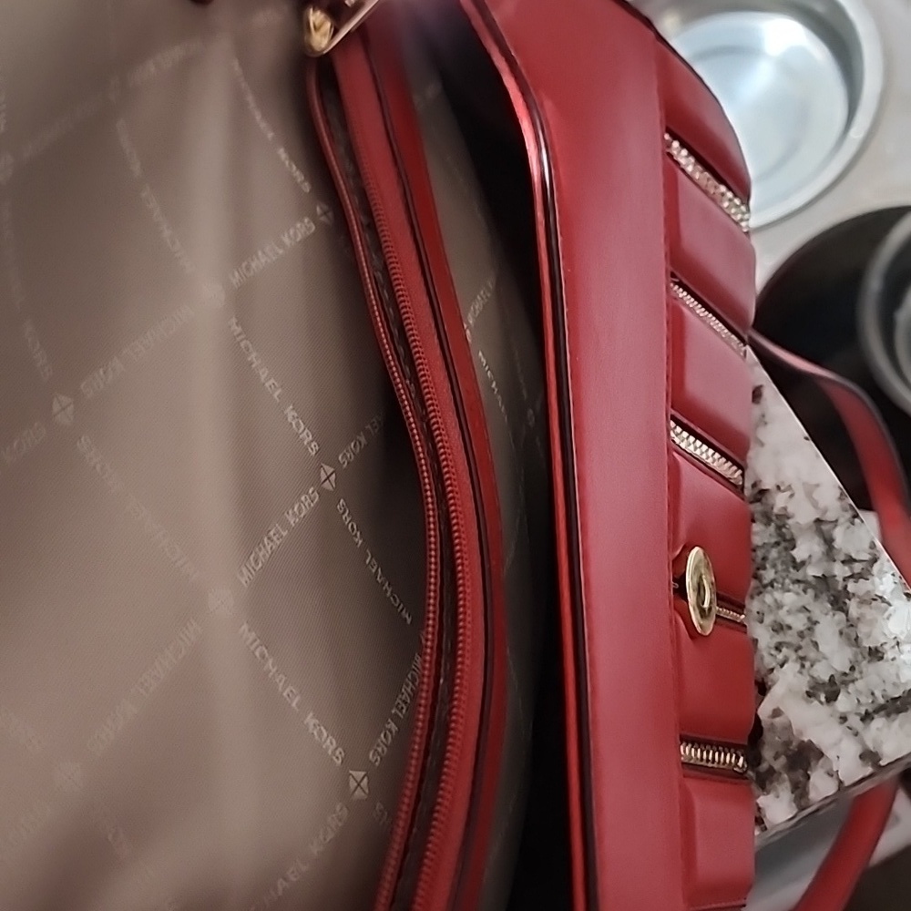 Gently used Michael Kors red leather crossbody bag. - Picture 10 of 12